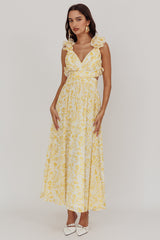Vestido largo Madara con espalda de cordones y estampado floral amarillo