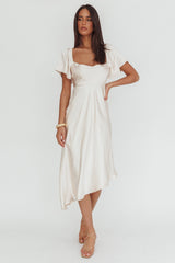 Vestido Midi Asimétrico Con Lazo Trasero Grayson Color Champán
