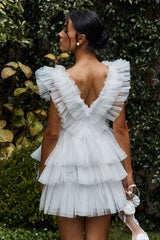 Minivestido blanco de tul con volantes