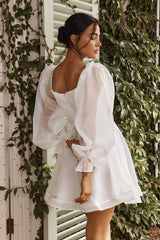 Minivestido de manga larga con brillo solar blanco