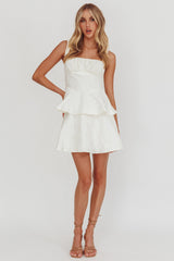 Minivestido con péplum y estampado floral "Provence Bloom" en color crema