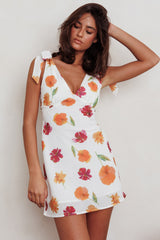 Minivestido con hombros anudados Mykonos Morning, naranja floral