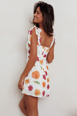 Minivestido con hombros anudados Mykonos Morning, naranja floral